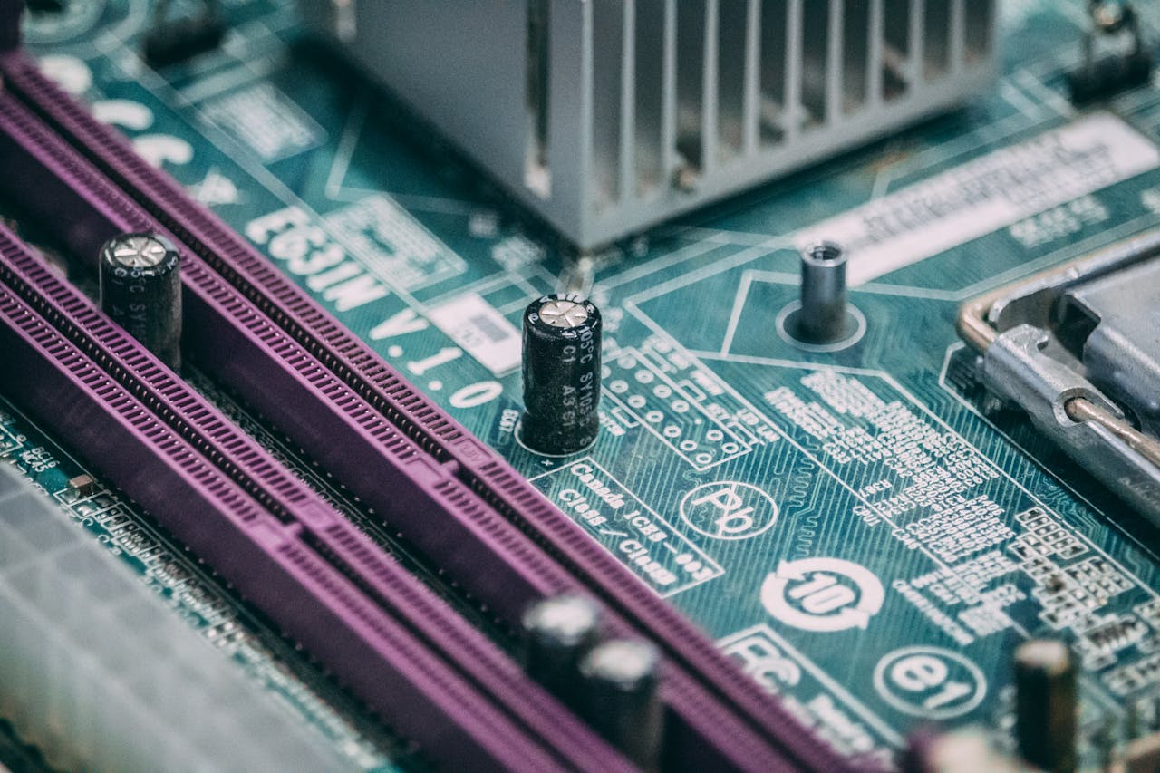 Detailed close-up image of a computer circuit board with capacitors and other components.